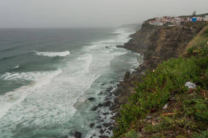 A cliff town over looking a stormy sea